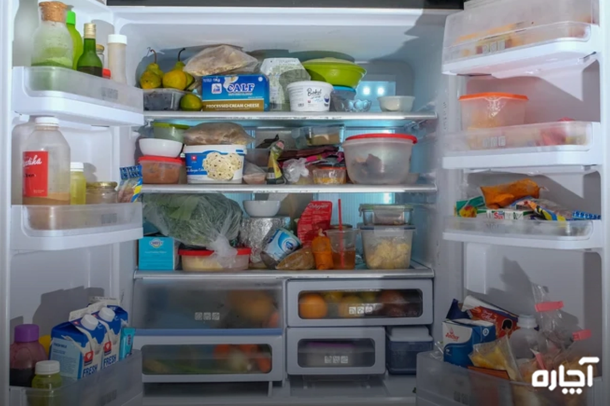 علت فریزر خنک و یخچال گرم؛ به دلیل پر کردن بیش از حد یخچال