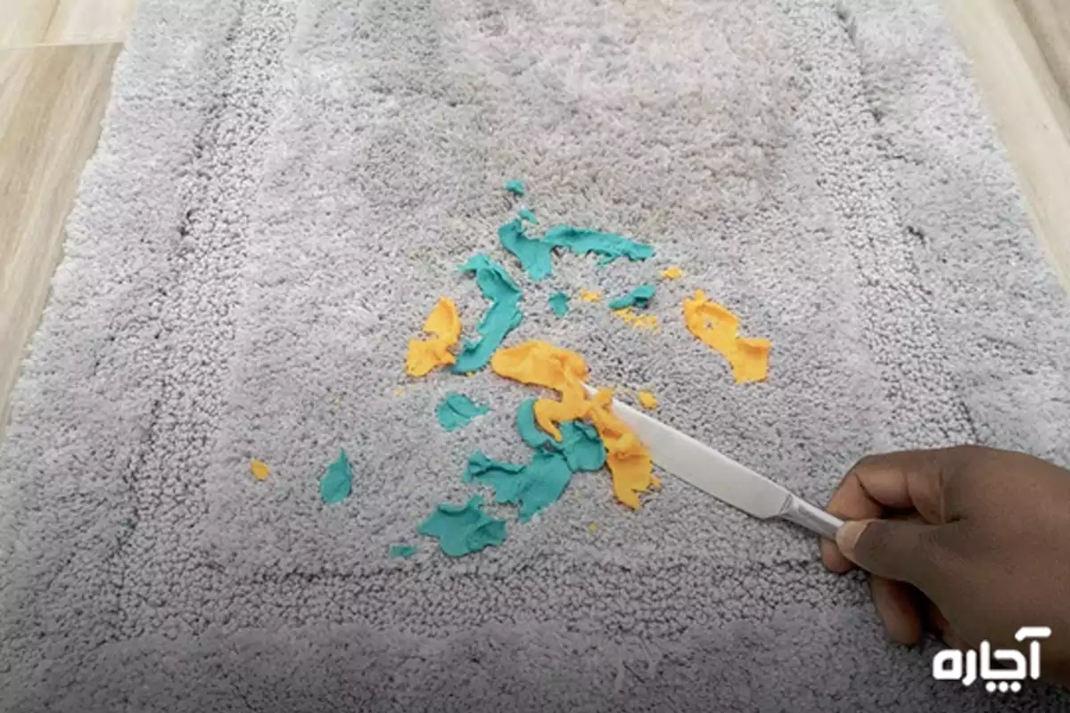 Removing play dough from carpet