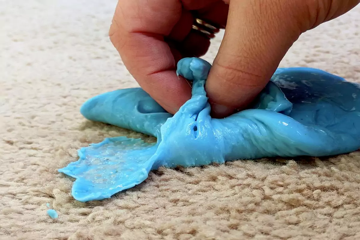 Removing play dough from carpet