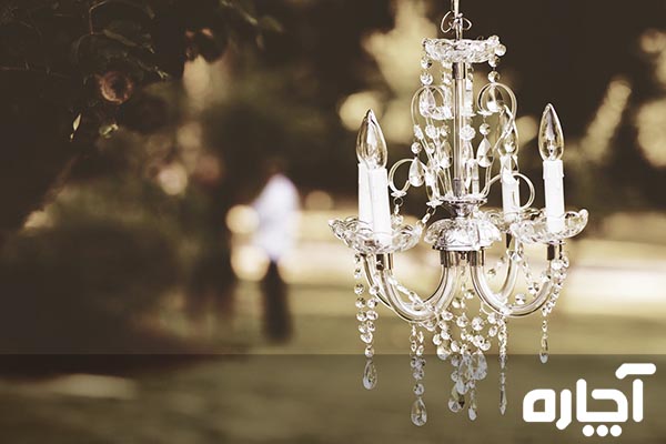 Cleaning-the-crystal-chandelier-by-completely-opening-the parts