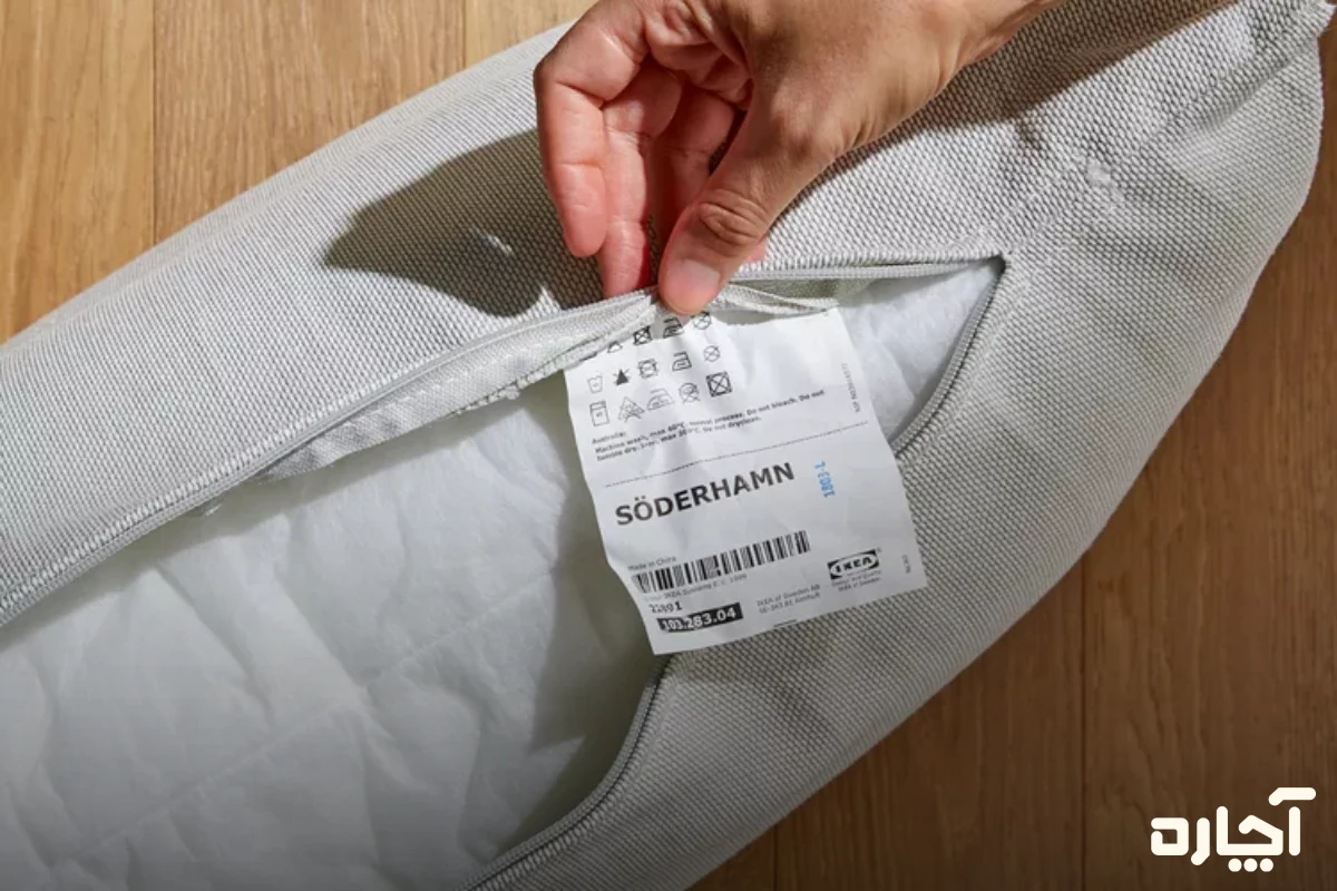 توجه به لیبل در نحوه استفاده از اسپری لکه بر مبل