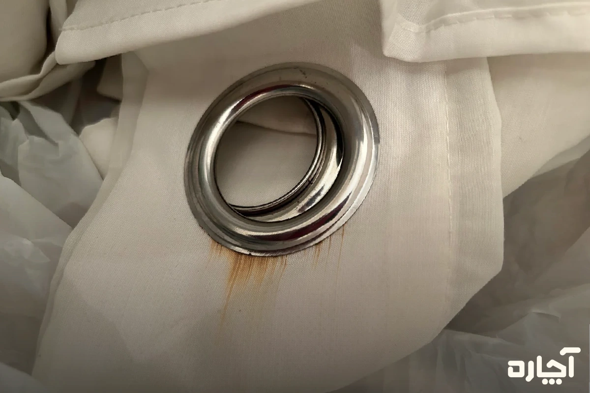 رفع زنگ زدگی پرده با خمیر تارتار و آب‌لیمو