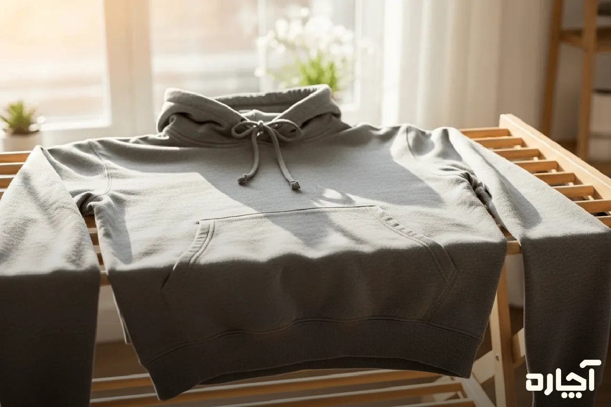 شستن هودی با دست و خشک کردن آن